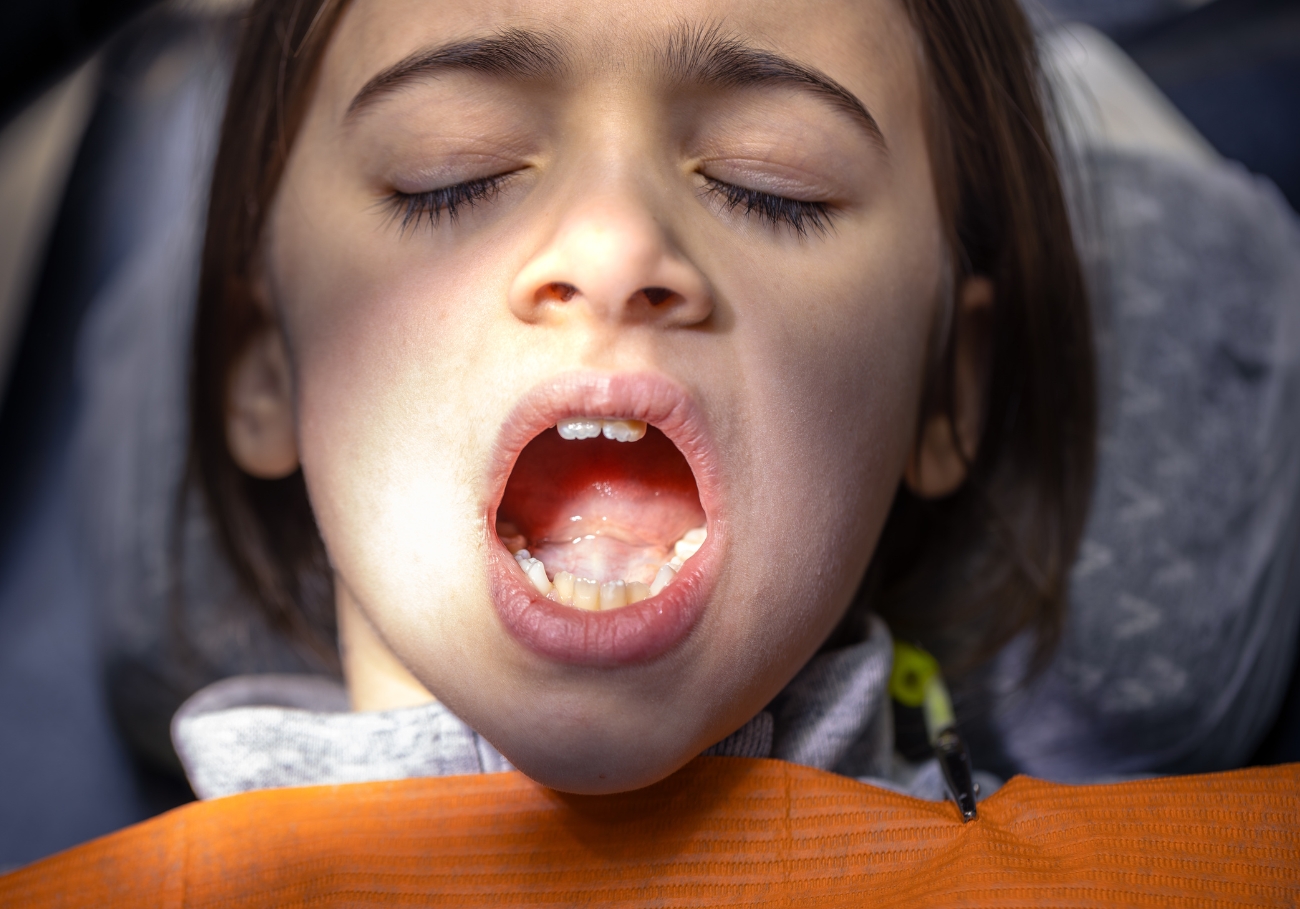 Child receiving dental check-up at a pediatric dental clinic in Coimbatore